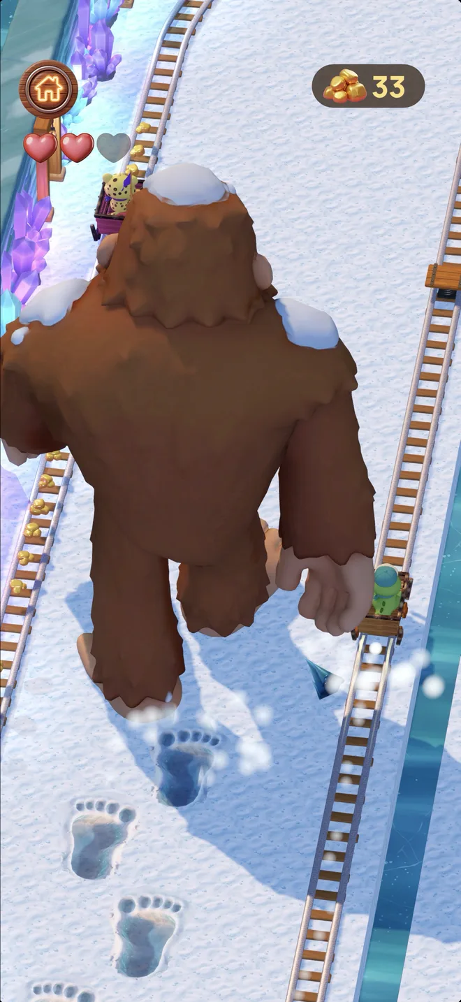 A giant snowy Bigfoot strides between the mine-cart tracks as Ollie and Leo race past