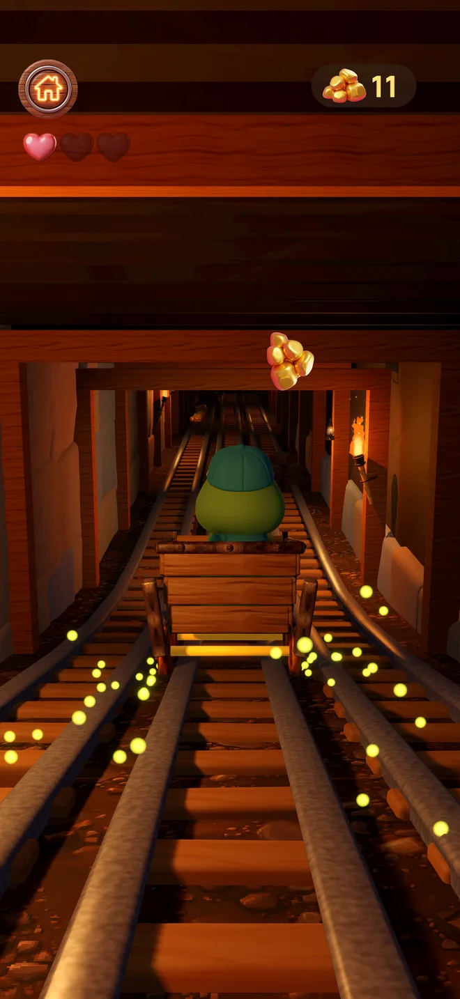 Ollie rides a mine cart through the gold mine tunnel